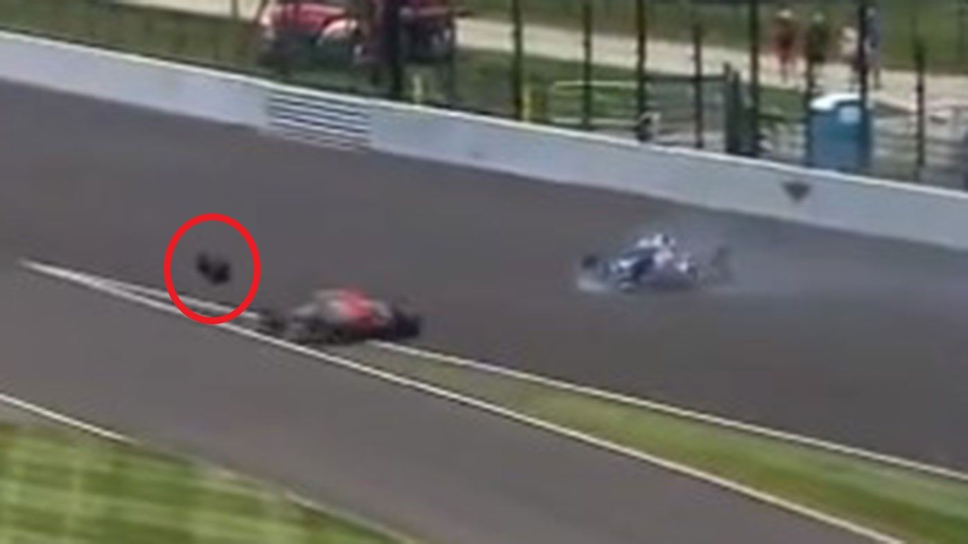 Conor Daly is hit by a tyre that came off Graham Rahal&#x27;s car at the Indy 500.