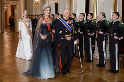 Queen Maxima of the Netherlands, and King Harald of Norway arrive at the gala dinner at the Norwegian Palace.