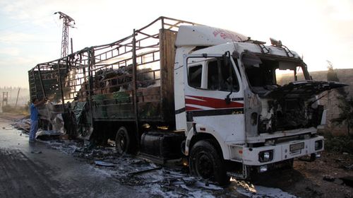 An aid truck destroyed by the airstrike. (AFP)
