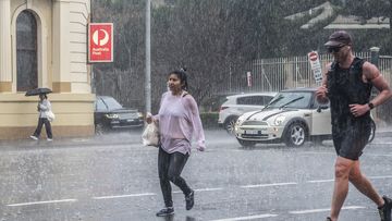 Sudden downpour catches people out in Paddington, Sydney