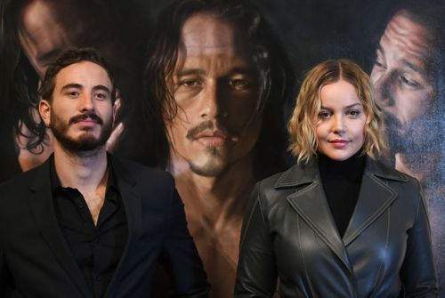 Actors Abbie Cornish, right, and Ryan Corr pose for photographs during a media preview of the 'Heath Ledger: A Life In Pictures' exhibition at the National Film and Sound Archive of Australia (NFSA) in Canberra. (AAP).