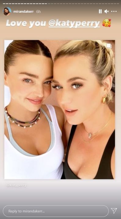 Miranda Kerr and Katy Perry take selfie at Aussie supermodel's product launch in July 2021.