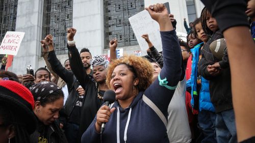 Thousands rally across US after police shooting deaths