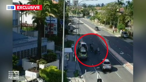 Bodycam footage shows the officers on the Gold Coast outnumbered and under attack by a group of men in the middle of a Gold Coast highway.