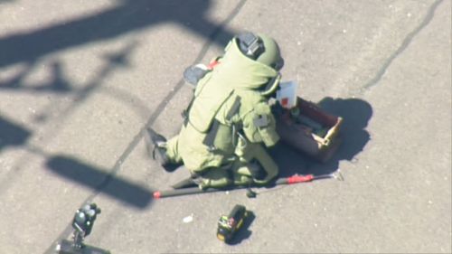 It is not yet known why the alleged explosives were brought to the police station. (9NEWS)