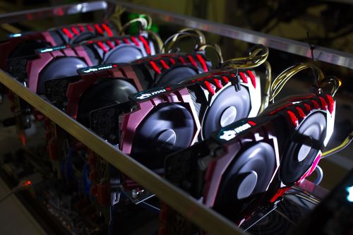 A cryptocurrency mining rig composed of Asus Strix machines operates at the SberBit mining 'hotel' in Moscow, Russia.