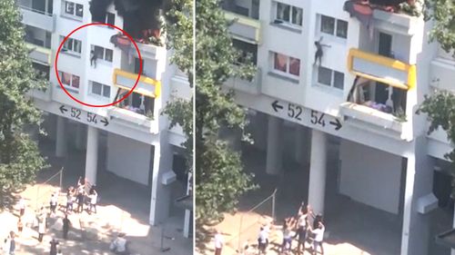 Two young brothers were saved from an apartment fire in the southeastern French city of Grenoble when they dropped about 10 metres from a window and were caught by people below