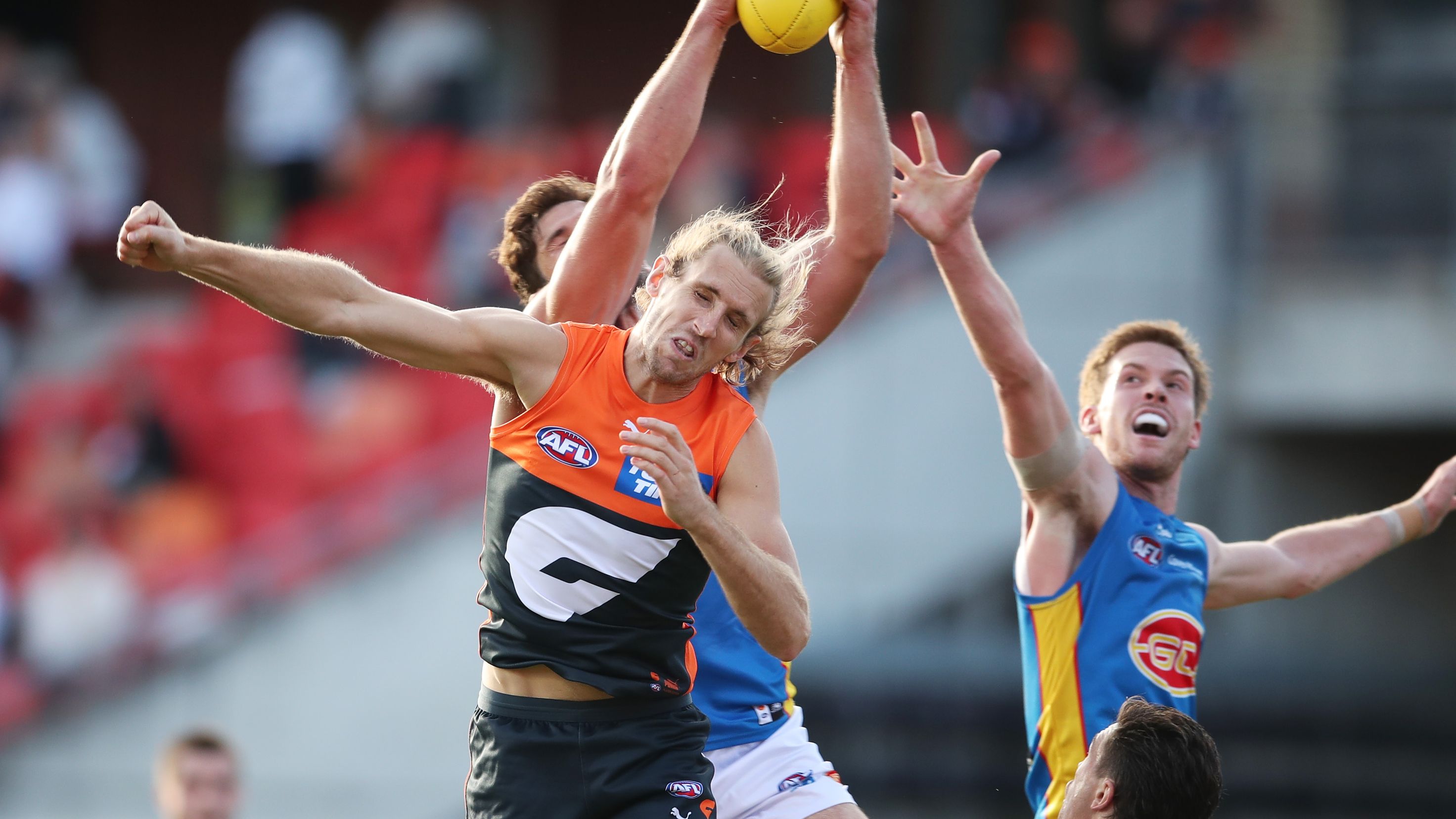 Giant Nick Haynes has a mark taken over him during the round three clash between the GWS Giants and the Gold Coast Suns.