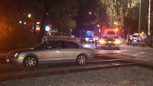 A train driver's quick reflexes have helped avoid disaster, after an elderly driver became stuck on the tracks in Adelaide.