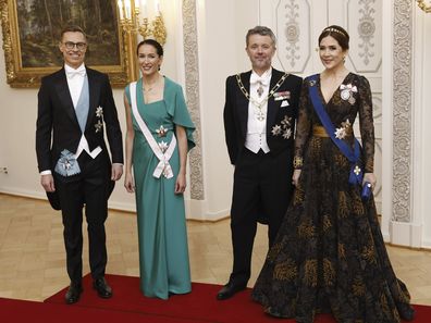 President of the Republic of Finland Alexander Stubb, left, and his spouse Suzanne Innes-Stubb pose for the media with Denmark's King Frederik X and Queen Mary, right, before a gala dinner at the Presidential Palace in Helsinki, Tuesday, March 4, 2025. (Roni Rekomaa/Lehtikuva via AP)