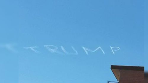 ‘Trump’ written in the sky above Sydney's south-west amid protest in CBD 