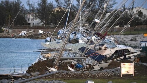 Damaged boats are shown in the aftermath of Hurricane Irma. (AAP)