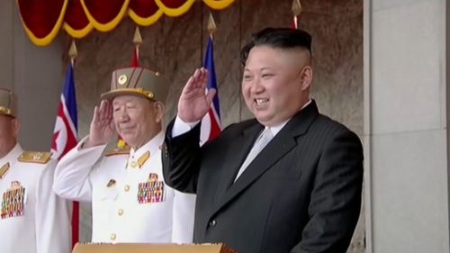 Kim Jong-Un saluted the crowd. (AFP)
