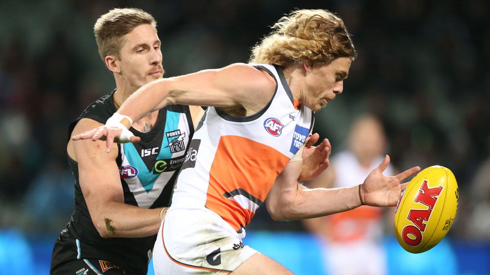 Giants Adam Kennedy with the ball (AAP)