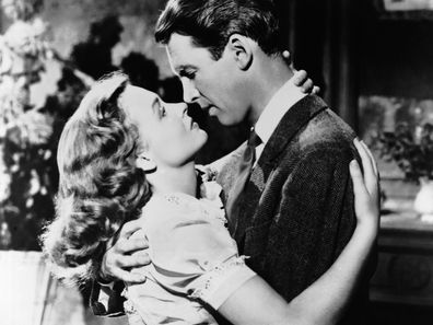 Actress Donna Reed as Mary Hatch and actor James Stewart as George Bailey in film 'It's a Wonderful Life', 1946. (Photo by Silver Screen Collection/Getty Images)