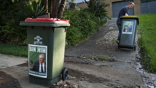 Peter Rickwood has anti Scott Morrison / Barnaby Joyce stickers on his bins. The Philip Ruddock-led Hornsby Council has sent him a letter threatening not to collect his rubbish if the stickers aren't removed. 22nd March 2022, Photo: Wolter Peeters, The Sydney Morning Herald.