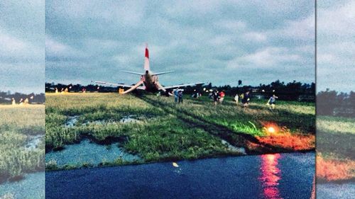 AirAsia Zest flight Z2272 overshot the runway at Kalibo Airport in the Philippines. (Twitter, @iamnataliamoon)