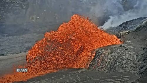In this screenshot taken from video provided by the U.S. Geological Survey, the Kilauea volcano spews lava on Friday, Aug. 22, 2025, in Hawaii Volcanoes National Park, Hawaii. (U.S. Geological Survey via AP)