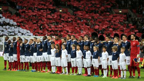 The French team during their national anthem. (AAP)