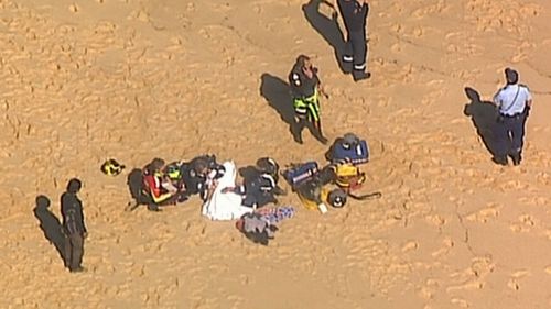 Emergency Services were called when the boat flipped and began to sink off the coast of Little Marley Beach in Sydney's Royal National Park.

