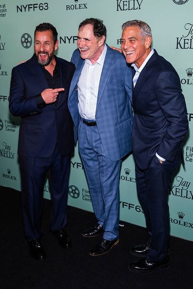 NEW YORK, NEW YORK - SEPTEMBER 29: (L-R) Adam Sander, Richard Kind and George Clooney attend the "Jay Kelly" red carpet during 63rd New York Film Festival at Alice Tully Hall, Lincoln Center on September 29, 2025 in New York City. (Photo by TheStewartofNY/FilmMagic)