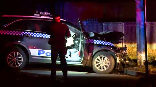 The police vehicle collided with a pole after a short pursuit. 