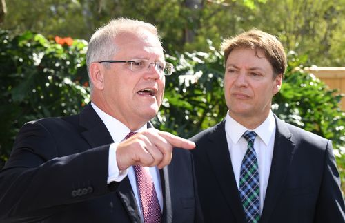 PM Scott Morrison, pictured today with Bonner MP Ross Vasta in the carpark of Esida Lodge Aged Care in Brisbane today.