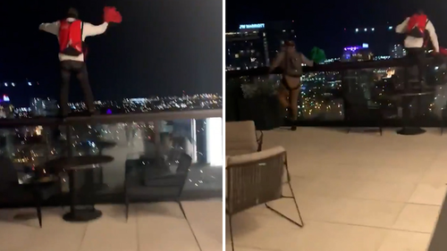Patrons at the hotel in Nashville were horrified as the BASE jumpers leaped into the air. 