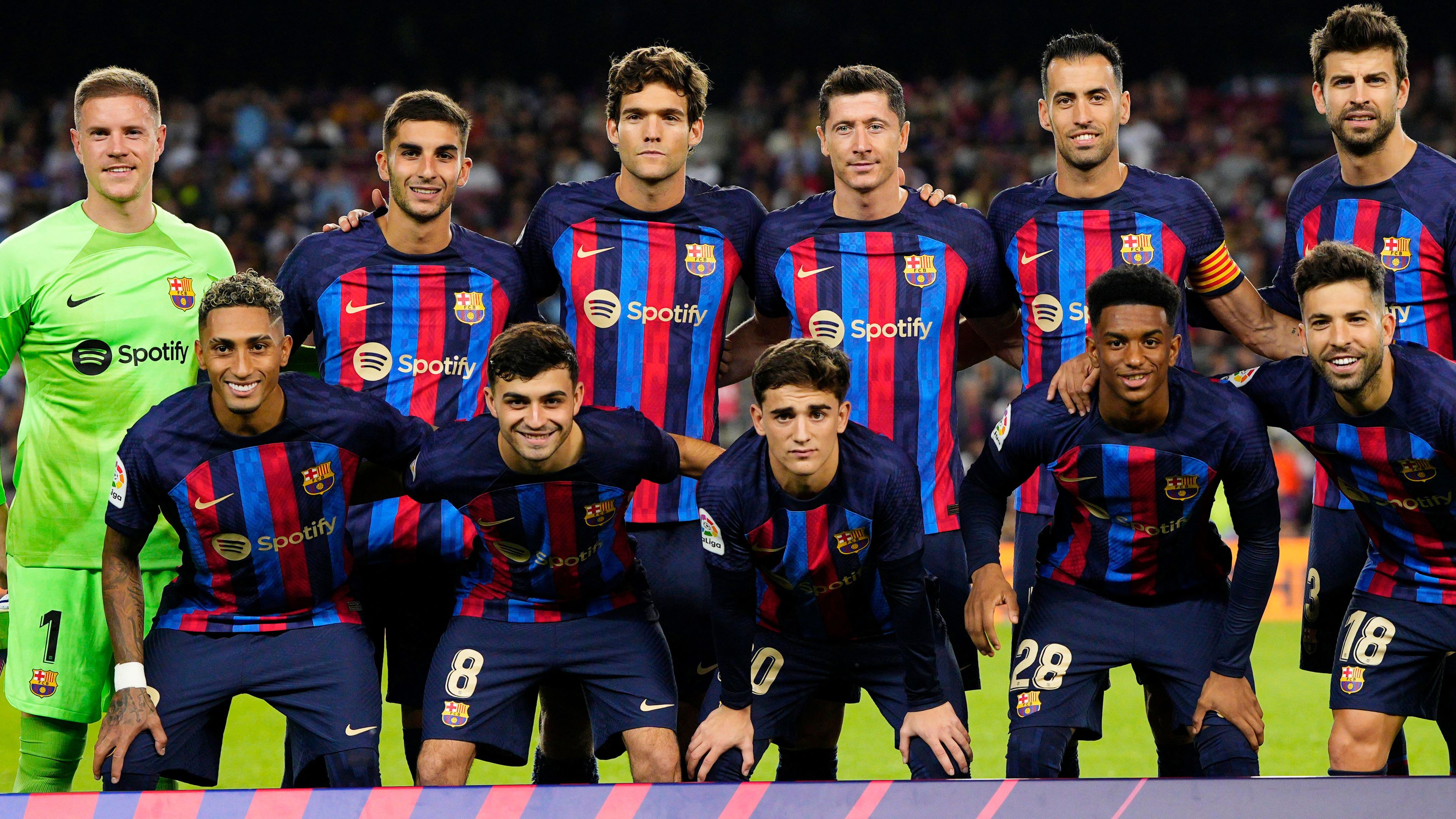 The Barcelona line up poses for a team photo ahead of their clash with RC Celta at Camp Nou on October 9.
