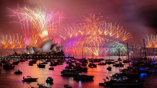 Sydney NYE 2024. HIGH RES. The midnight New Year's Eve fireworks on Sydney Harbour, viewed from Mrs Macquaries Chair. 31 December 2024. Photo: Wolter Peeters, The Sydney Morning Herald.