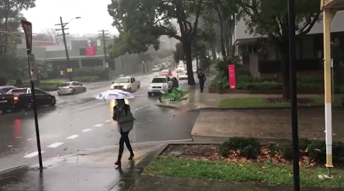 In Waterloo, those brave enough to head out on foot are guaranteed to get soaked by heavy rains.