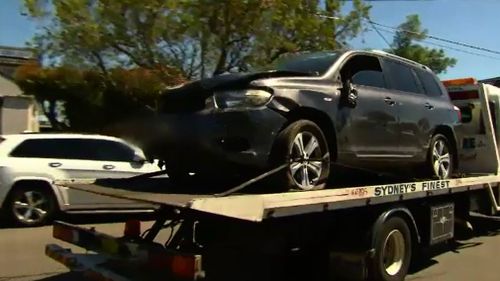 The car was towed away from the school this afternoon. (9NEWS)