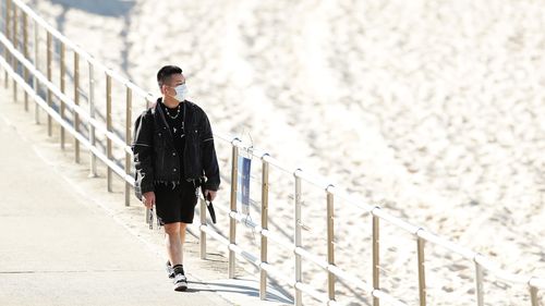 A man wearing a face mask at Bondi Beach on July 20, 2020 in Sydney, Australia. 