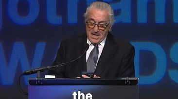 Robert De Niro reads his original speech from his phone at Gotham Awards.