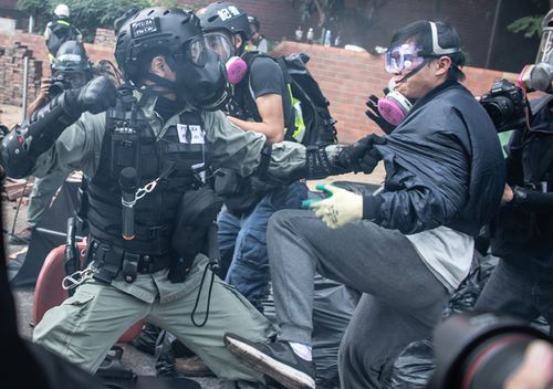 The pitched battle for control of Hong Kong Polytechnic University began last week as demonstrators for days fortified the campus to keep the police out. On Monday, cornered by security forces determined to arrest them, they desperately tried to get out but faced a cordon of officers armed with tear gas and water cannons.