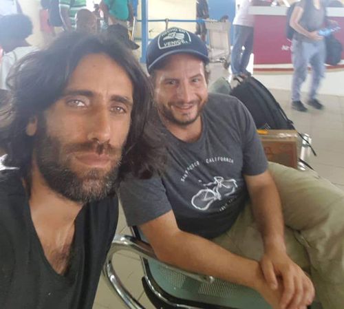 Dan Ilic and Behrouz Boochani at Manus Island Airport.