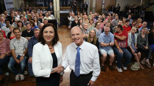 Queensland Opposition leader Annastacia Palaszczuk and Premier Campbell Newman pose before the leaders debate. (AAP)