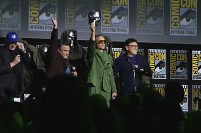Kevin Feige, from left, Joe Russo, Robert Downey Jr., and Anthony Russo attend a panel for Marvel Studios during Comic-Con International 