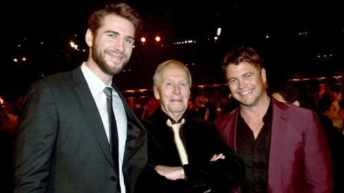 Liam and Luke Hemsworth with Paul Hogan.