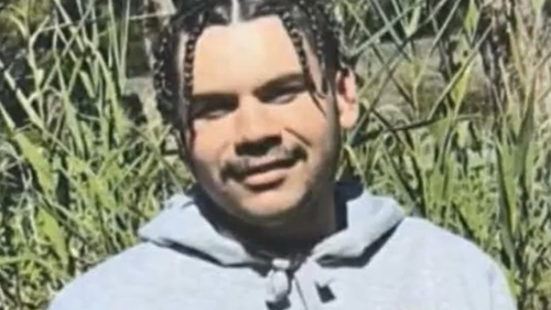 An Indigenous man stabbed to death in a targeted machete attack in Victoria's Gippsland region is being remembered as a loving friend as police try to find his killer.