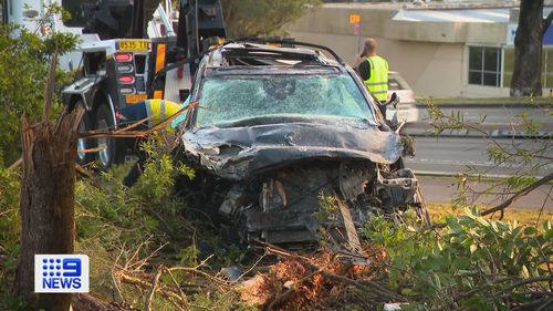 A﻿ luxury car has ploughed through a concrete wall and left a scene of destruction in Sydney's Norwest.