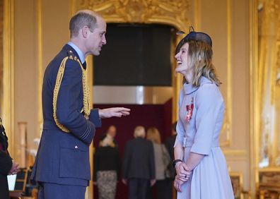 Prince William, the Prince of Wales, left, awards Mrs Ellen Convery (Ellen White), former soccer player, with the Commander of the Order of the British Empire, at Windsor Castle, Windsor, England, Wednesday, Feb. 7, 2024.
