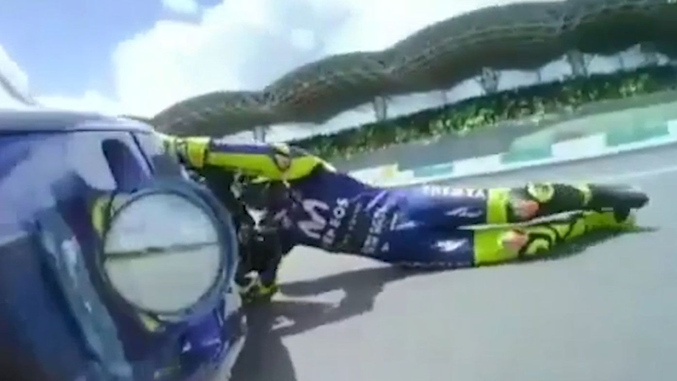 Marc Marquez capitalises on Valentino Rossi's shocking crash to take out Malaysian GP