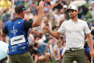 Joaquin Niemann of Chile celebrates winning the Men&#x27;s ISPS HANDA Australian Open with his caddie during the 2nd playoff hole against Rikuya Hoshino of Japan in the ISPS HANDA Australian Open at The Australian Golf Course on December 03, 2023 in Sydney, Australia. (Photo by Matt King/Getty Images)