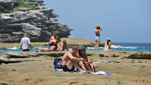 People enjoy the water at Tamarama Beach in Sydney. (AAP)