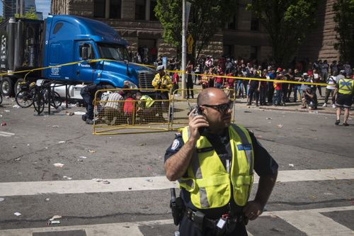 Two suspects have been taken into custody. (Tijana Martin/The Canadian Press via AP)