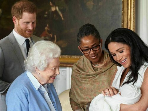 The Queen meeting her new great-grandchild Archie.