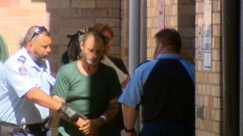 Anthony Sampieri is led to Maroubra Police Station today. (9News)