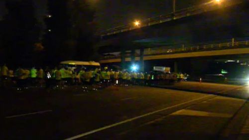 Part of the freeway was closed overnight due to the charity run which the group were participating in at the time of the crash. (9NEWS)