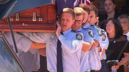 Today, his tearful colleagues from the NSW Police Force Academy carried his coffin into the church.

